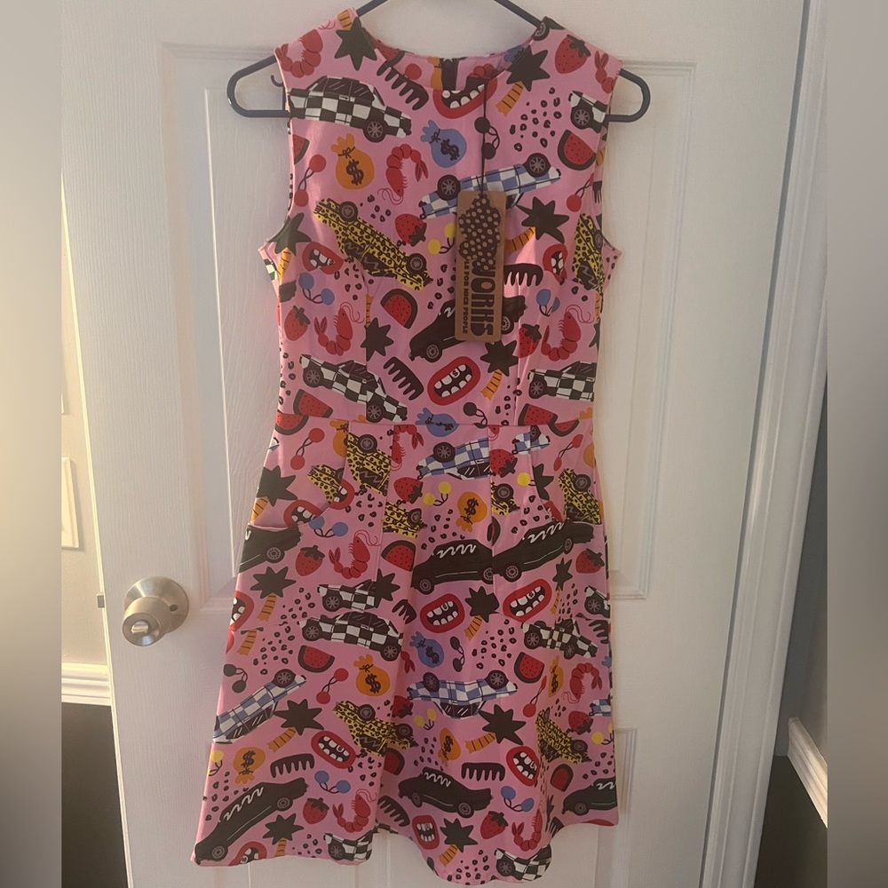 Nooworks Edie rollout, Pink Dress with Bold Multicolor Graphics